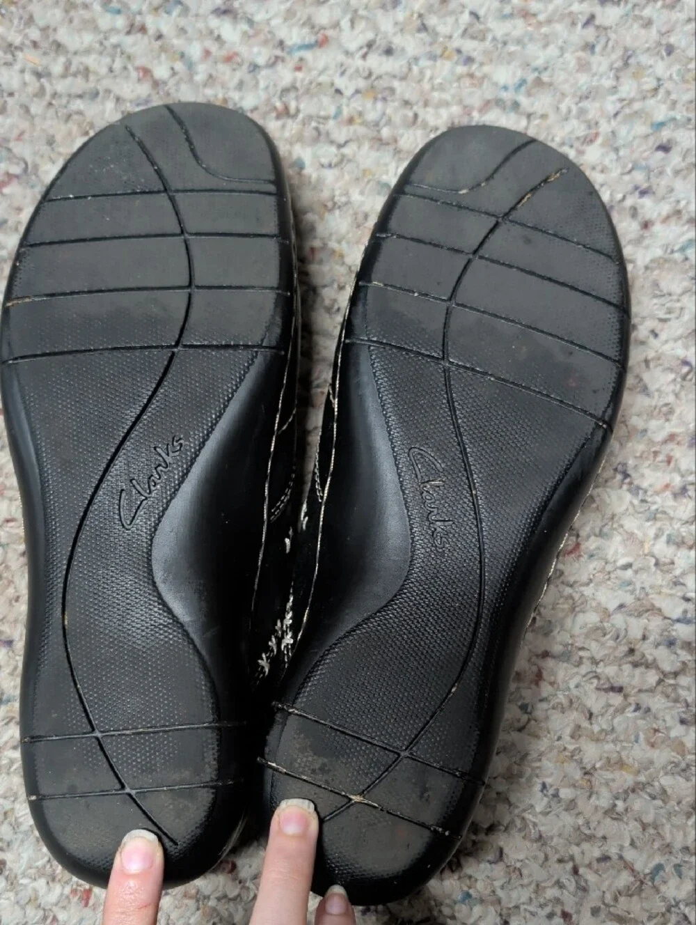 Clarks Black Leather Slip-On Loafers with Contrast Stitching and Button Accent
